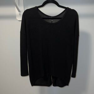 Lightweight black sweater with gold zipper down back